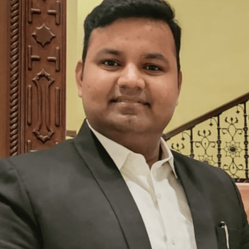 It's a Headshot of Mr. Aditya Bharadwaj, Director and Founder of Nivom Realty Company